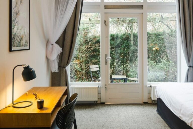 Slaapkamer met Natuurzicht bij Athanor